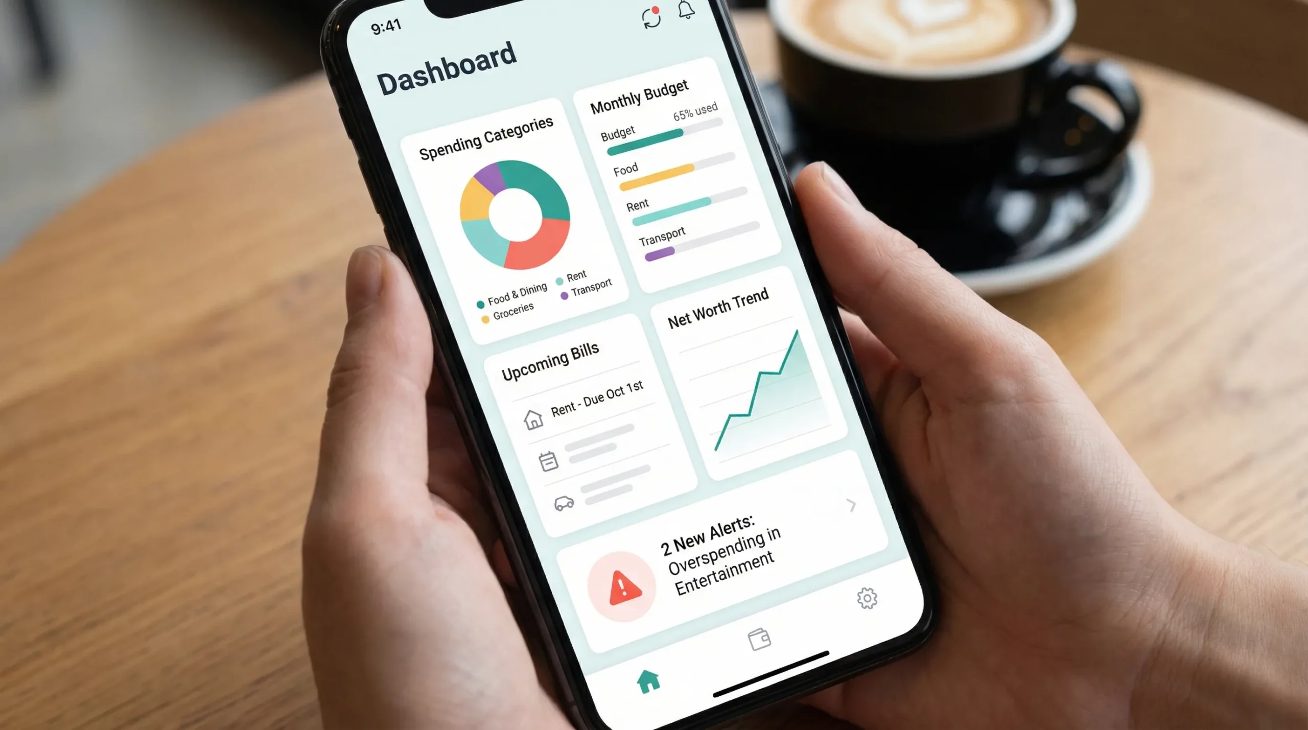 Best Personal Finance App: 2025 Shortlist 2 An illustration of a personal finance app dashboard showing spending categories, monthly budget progress bars, upcoming bills, net worth trend line, and alert notifications, presented as clean UI tiles without readable brand text.